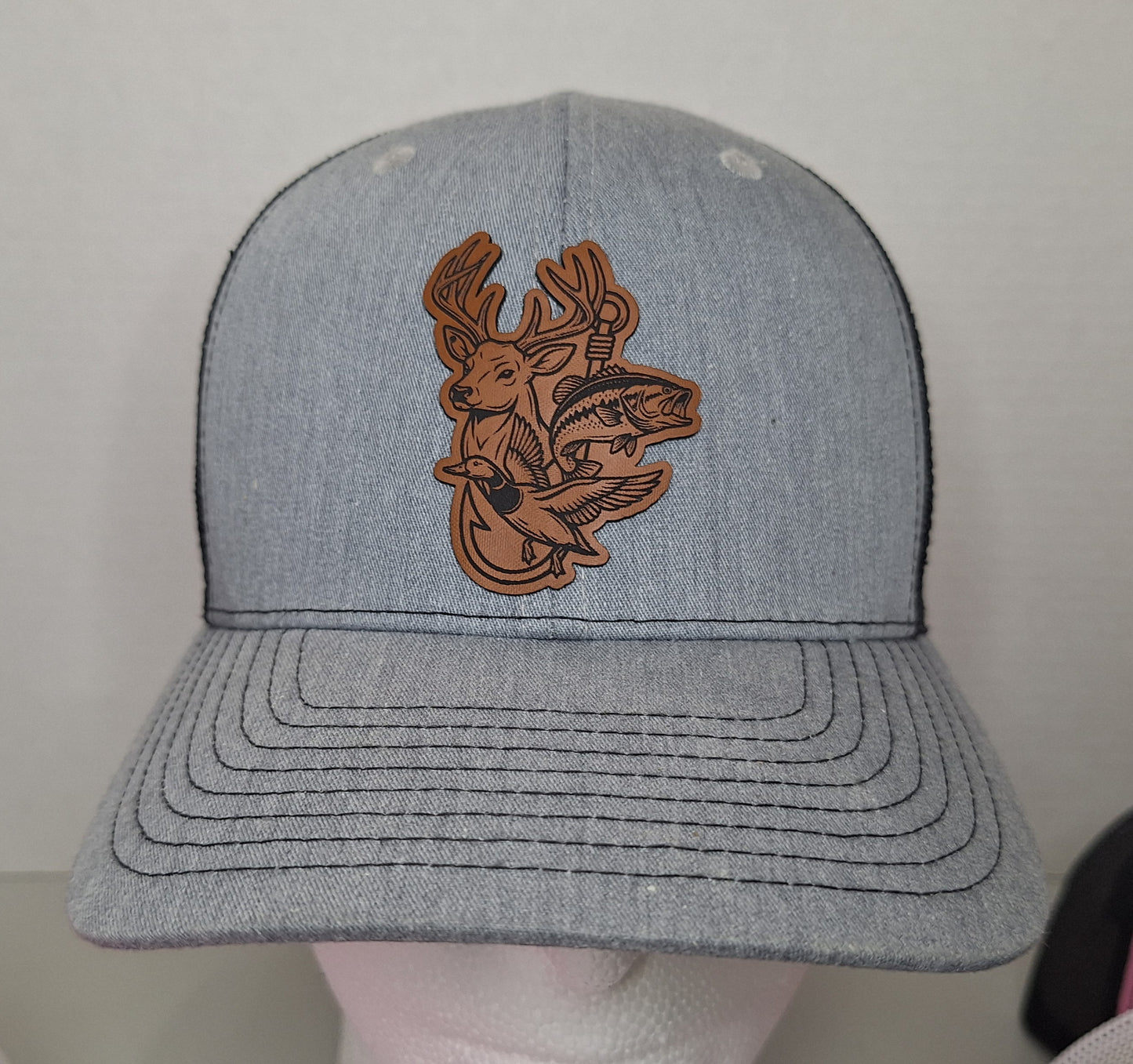 Fish, duck, deer and hook Richardson Trucker hat